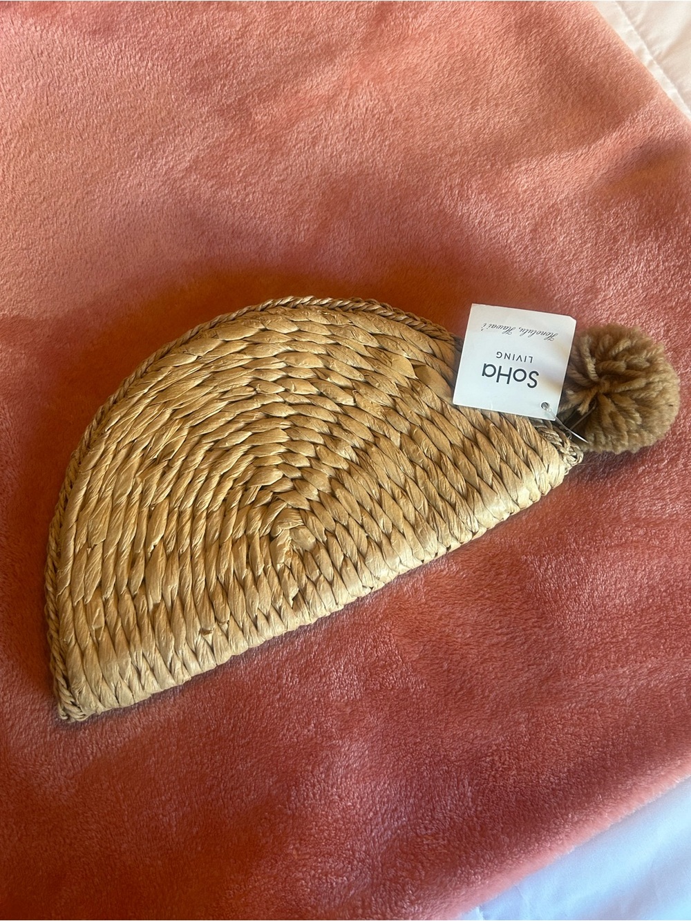 Soho Living Woven Straw Pom clutch in Natural